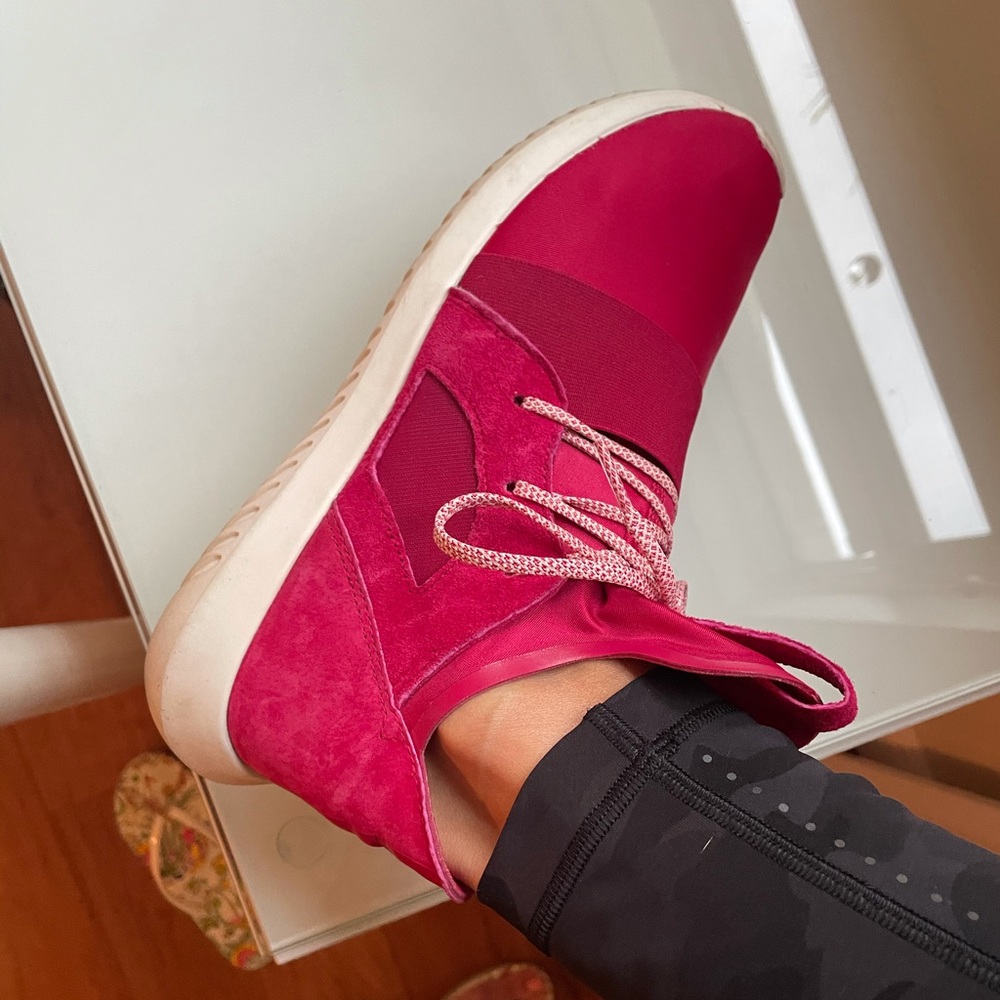 Red adidas tubulars